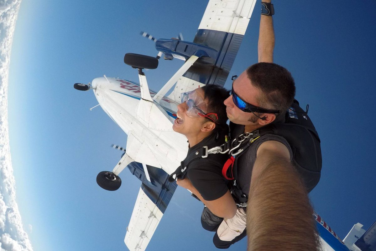 Tandem jumper in freefall after exciting Skydive City aircraft.
